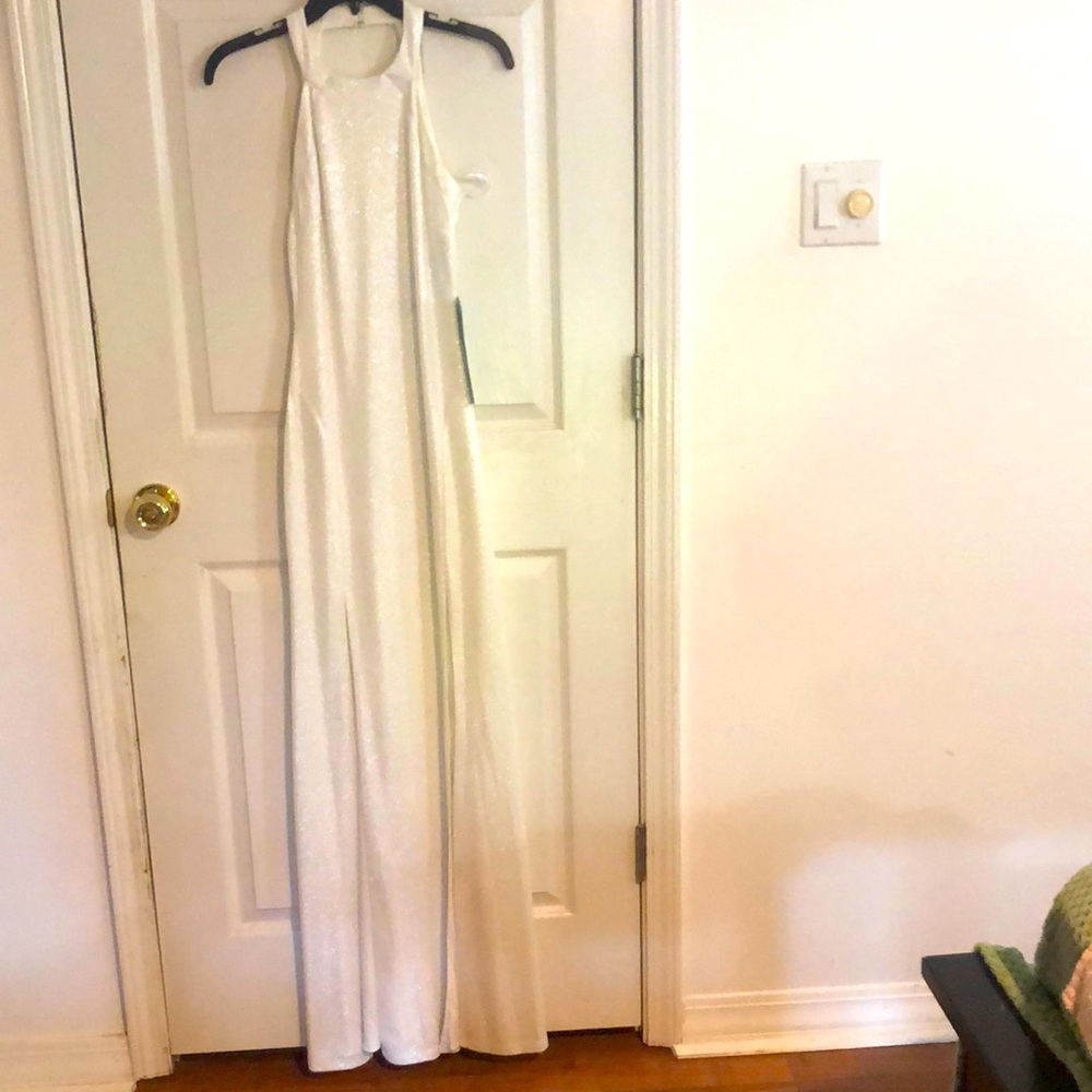 Ivory/silver glitter long halter formal. Backless.